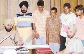 Superintendent of Police Gurpreet Toor with four accused