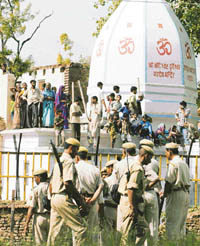 Security personnel keep vigil near the outer security fence after the terrorists tried unsuccessfully to enter the disputed Ram temple site in Ayodhya on Tuesday. All six militants were killed in the ensuing gun battle. 