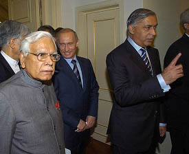 External Affairs Minister K Natwar Singh, Pakistani Prime Minister Shaukat Aziz and Russian President Vladimir Putin arrive to attend the Shanghai Cooperation Organisation