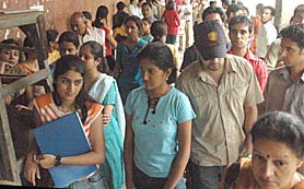 Aspiring candidates wait for their turn during LLB admissions at Panjab University on Wednesday.