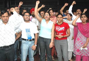 Members of the Medical Entrance Problem Redressal Forum hold a protest in support of their demand in Sector 17, Chandigarh.
