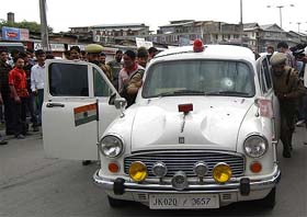 The damaged car of J&K Minister of State for Public Health & Engineering Syed Bashir Ahmad who escaped bid on life when militants opened fire on his car at Budshah Chowk in Srinagar