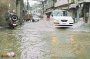 A waterlogged street leading to Bajwa Nagar. 