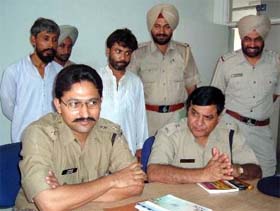 SSP Kapil Dev addresses a press conference in Bathinda on Wednesday after arresting two tantriks for duping people