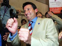 Londons bid leader and former Olympic champion Sebastian Coe rejoices after the announcement that London will host the 2012 Olympics in Singapore on Wednesday. 