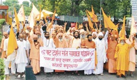 Members of the Shatt Darshan Sant Samaj Punjab take out a procession in Ludhiana on Thursday