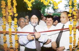 Mr Harwant Singh, General Manager, PNB, Punjab zone, inaugurates "dawn to dusk" banking at the Sarabha Nagar branch of the PNB in Ludhiana on Friday