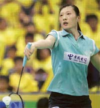 Olympic and world champion Zhang Ning of China battled past compatriot Zhou Mi to win her fourth Singapore Open badminton title in five years