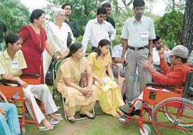 Patients suffering from muscular dystrophy share their problems at the two-day camp at Barog, Solan