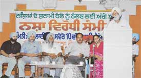 A speaker delivers a lecture at a seminar against drug abuse in Samrala