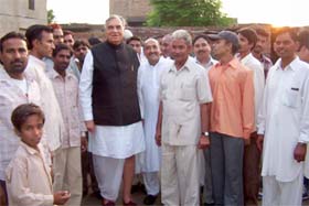 Madhya Pradesh Governor Bal Ram Jakhar visits the house of Municipal Council president Tulsi Ram located in a slum area in Abohar
