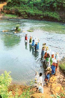 Women trudge miles to get salt and oil