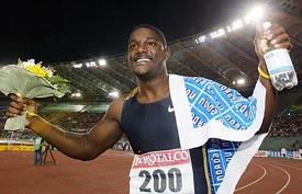 Justin Gatlin of the USA celebrates after winning the mens 100m race at the Golden League athletics meet in Rome