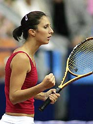 Anastasia Myskina of Russia gestures during her match against Venus Williams of the USA in their Fed Cup semifinal tie in Moscow on Saturday