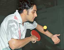 Vikas Sharma of AG Audit, Punjab on his way to winning mens title in the 11th Bhavan Vidyalaya Chandigarh State Table Tennis Tournament at Sector-23, Chandigarh, on Sunday.