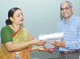 Dr O.P. Bajpai, Director of the National Institute of Technical Teachers Training and Research (NITTTR), felicitates the institute Chairperson, Ms Rajesh Kumari, during a workshop in Chandigarh on Sunday.