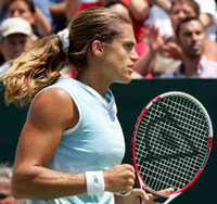Frances Amelie Mauresmo gestures during her match against Spains Nuria Llagostera Vives in the Fed Cup semifinal tie at Aix-en-Provence in France on Sunday. Mauresmo won 6-3, 6-1.