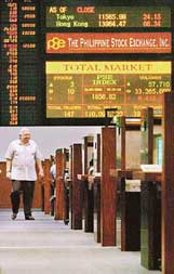 A trader at the Philippine Stock Exchange in Manila on Monday. 