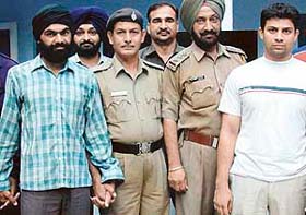 Joga Singh and Samir in the custody of police in operation cell, Sector 26, Chandigarh