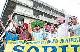 SOPU activists protest outside the Administrative Block, Panjab University, against the Controller of Examination on Monday