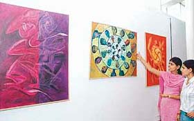 Students from Kurukshetra University display their work at a painting exhibition, at Government Museum Art Gallery, Sector 10, Chandigarh