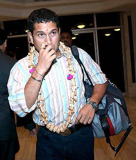 Sachin Tendulkar arrives to join his team-mates at the fitness camp in Bangalore on Tuesday night