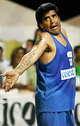 Argentine soccer legend Diego Maradona gestures during a friendly beach soccer match in Cesenatico, central Italy, on Tuesday