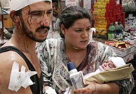 A couple, injured in a suicide car bomb attack, in Baghdad