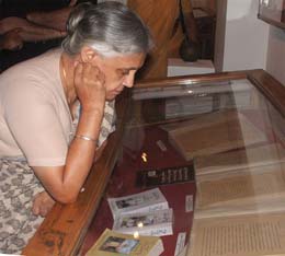 Delhi CM Shiela Dikshit having a close looks at some books after the inauguration of Jamia Revisited, an exhibition of rare photographs and mementos at India International Centre in the Capital