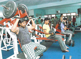 Sweat it Out: A well-toned body worked out to perfection in gym is the latest fad among Phagwara residents.