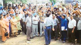 Members of the State Bank of Patiala Employees Union stage a demostration in front of the regional office, Miller Ganj, in Ludhiana