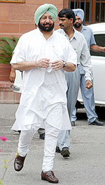 Punjab Chief Minister Amarinder Singh comes out after meeting Prime Minister Manmohan Singh in New Delhi on Thursday. 