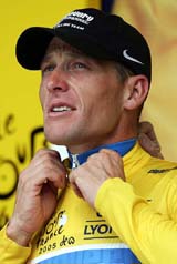 Lance Armstrong of the USA wears the leaders yellow jersey on the podium after the 173-km 11th stage of the 92nd Tour de France cycling race between Courchevel and Briancon on Wednesday