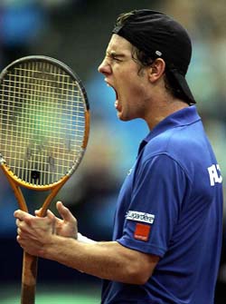 Richard Gasquet of France rejoices after winning a point against Russias Igor Andreev during their Davis Cup quarterfinal match in Moscow on Friday