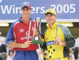 England captain Michael Vaughan shares the one-day tri-series trophy with his Australian counterpart Ricky Ponting