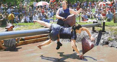 Sara Lee knocks out Brittney Yolo at the World Pillow Fighting Championship in Kenwood, California
