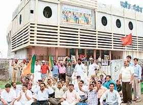 BJP activists stage a demonstration outside Orient Theatre in Ludhiana