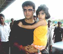 Sourav Ganguly with his daughter Sana at the Kolkata airport on Saturday before his departure for London to play county cricket. 