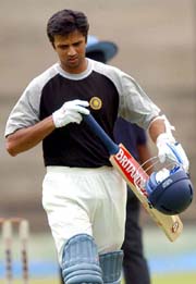 Rahul Dravid returns to the pavilion after getting out on the first ball during a practice match between Dravid XI and Virender Sehwag XI at the Chinnaswamy Stadium in Bangalore on Saturday. 