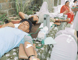 Volunteers donate blood at a camp organised by the Shirdi Sai Samaj in Sector 29, Chandigarh, on Sunday. 