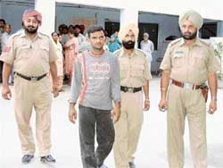 Faizal, the main accused, in police custody.