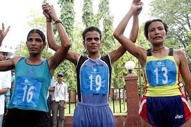 (From left) Sarabjit Kaur of Punjab Police, Pampa Chanda of Eastern Railway and Hindangmayum Sangini Devi of Manipur Sports Club, who stood third, first and second, respectively, in the womens 21-km race at the 16th Mayor Varsha Marathon in Thane on Sunday.