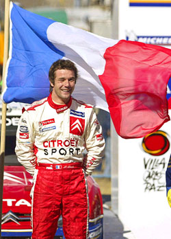 Frances Sebastien Loeb smiles after his victory at the XXV Argentine Rally on Sunday. Loeb made world rally history as the first driver to win six races in a row and seven in a single season