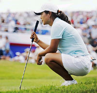 Meena Lee of South Korea lines up her final putt on the 18th hole during the final round of the BMO Canadian Womens Open at Glen Arbour in Halifax, Nova Scotia