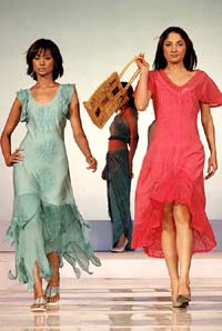 Models present creations at the inauguration of 35th India International Garment Fair at Pragati Maidan in New Delhi on Tuesday. 
