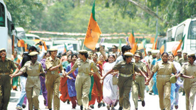 Woman activists of Bharatiya Janata Party shout anti-government slogans as they take part in a demonstration held to protest against the recent hike in power tariff by the Delhi government near Delhi Secretariat in the Capital on Tuesday