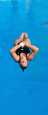 Canadas Blythe Hartley dives in the womens 1m springboard event at the World Aquatic Championships in Montreal