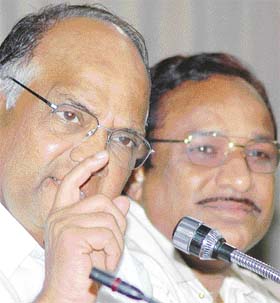 Union Minister for Agriculture, Food and Civil Supplies, Sharad Pawar with Minister of State for Agriculture Kantilal Bhuria, address a press conference in New Delhi