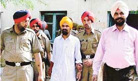 Jaswant Singh being produced in the court at Muktsar on Wednesday.
