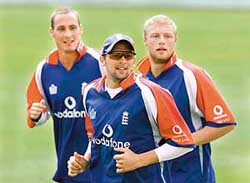Simon Jones, Steve Harmison and Andrew Flintoff of England take part in a practice session at Lords in London on Wednesday. 